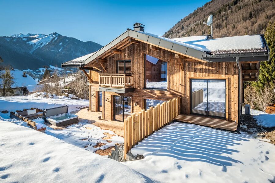 Luxury wooden chalet in Morzine from Bluemoon with snow all around