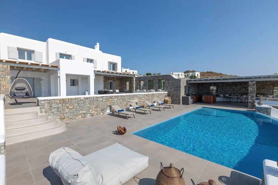 Close of luxury Villa Harmony and the sun loungers around the pool