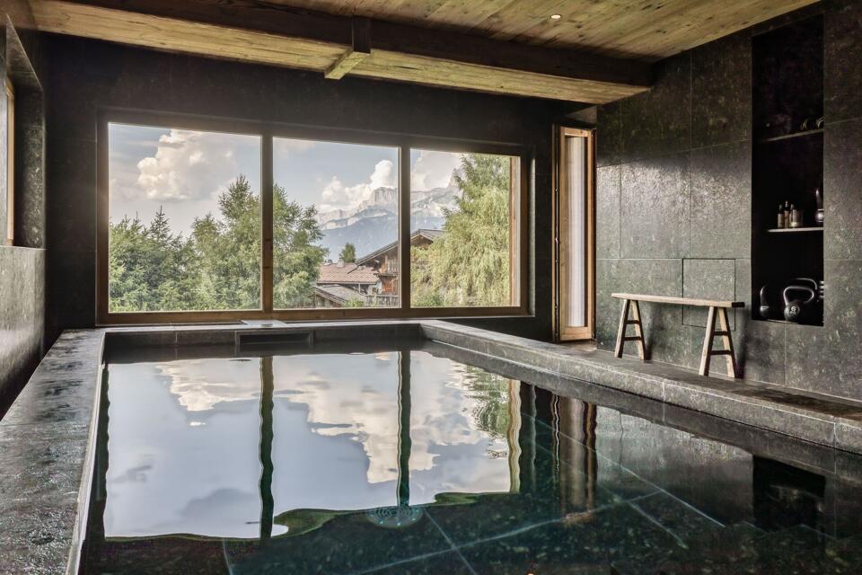 Chalet La Forge indoor pool with mountain views – luxury chalet in Megève with spa