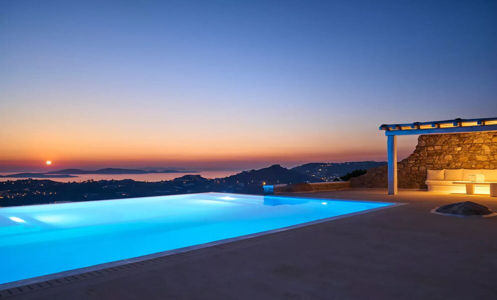 Evening view overlooking the infinity pool and the Aegean sea