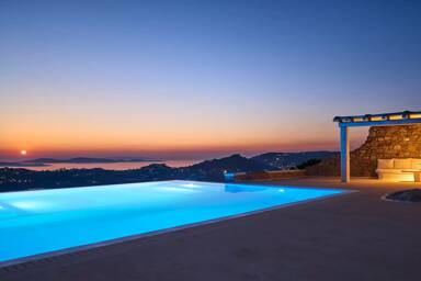 Evening view overlooking the infinity pool and the Aegean sea