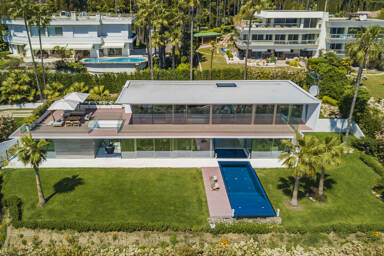 Aerial view of Villa Ophelia’s minimalist architecture and poolside design, set within a private enclave in the exclusive Californie district