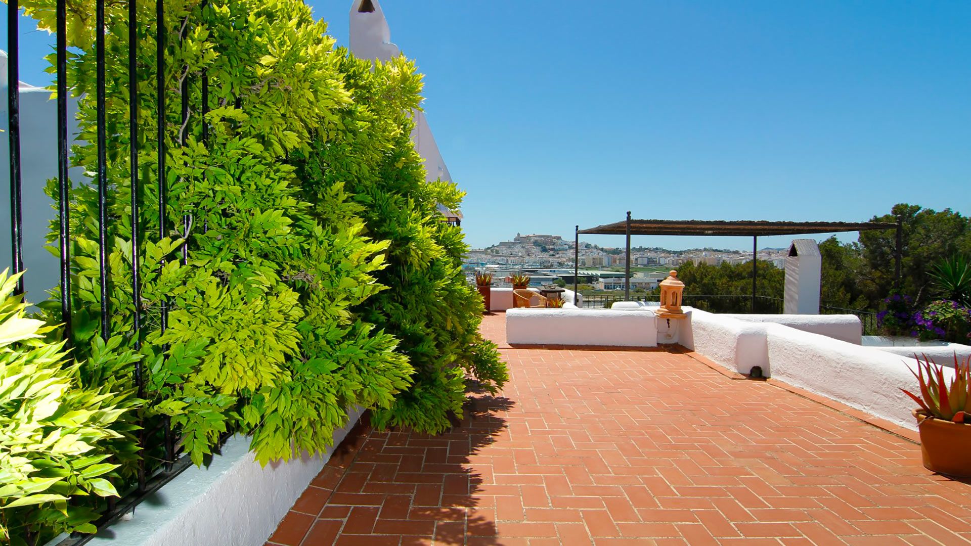 Sunlight beaming down on the exterior of Can Bab in Ibiza available to rent with Bluemoon