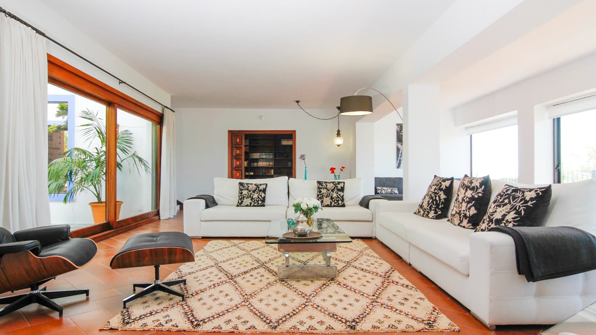 Large living area at Can Bab in Ibiza with plenty of natural light and comfortable seating