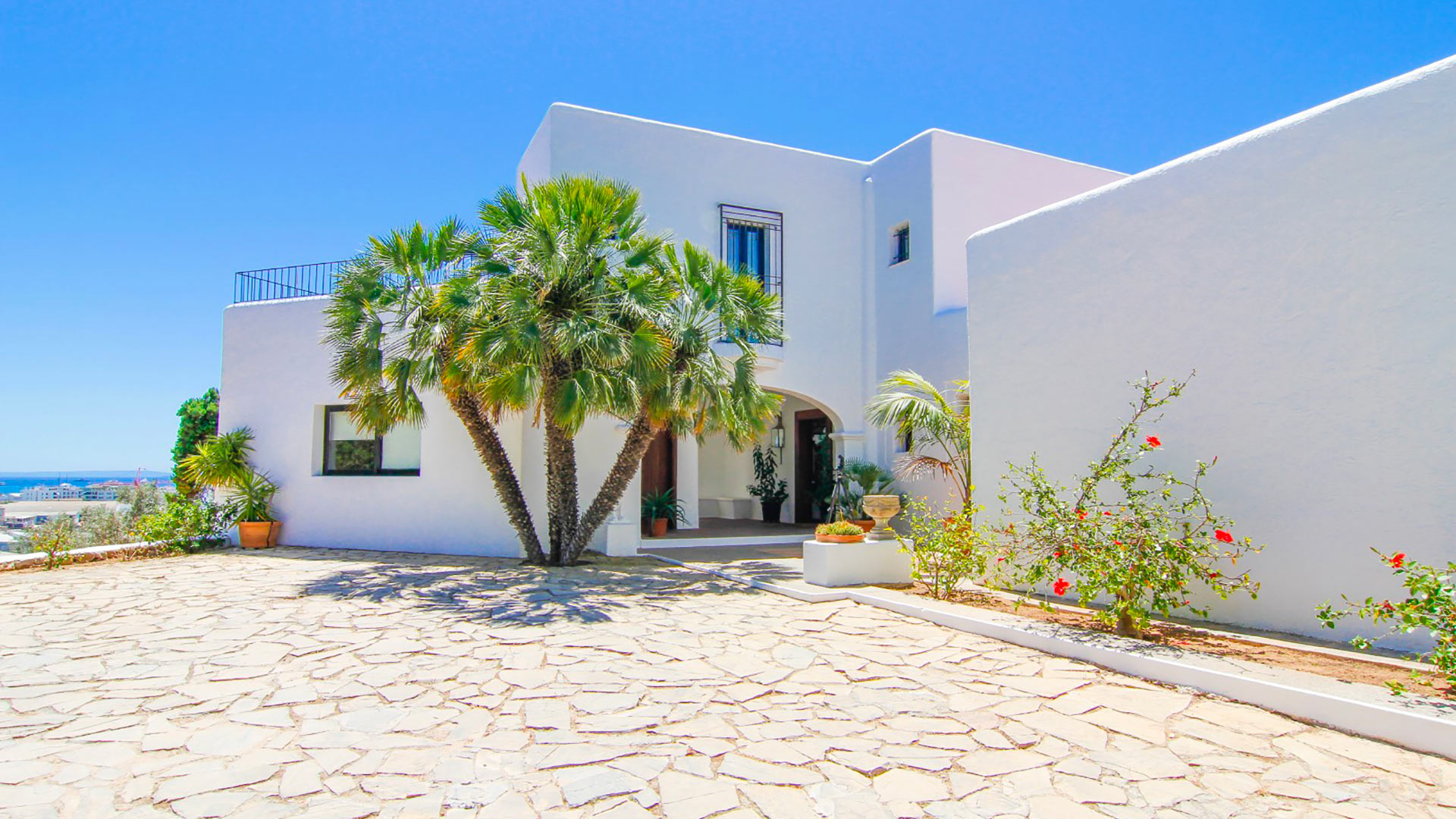Front exterior at Can Bab in Ibiza which beautifully captures Ibizan architectural style