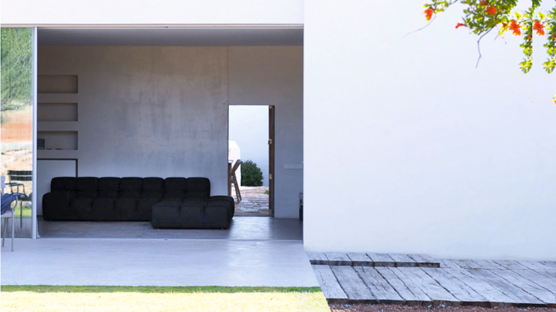 The view into the living space at Villa Can Basso in Ibiza from the peaceful exterior