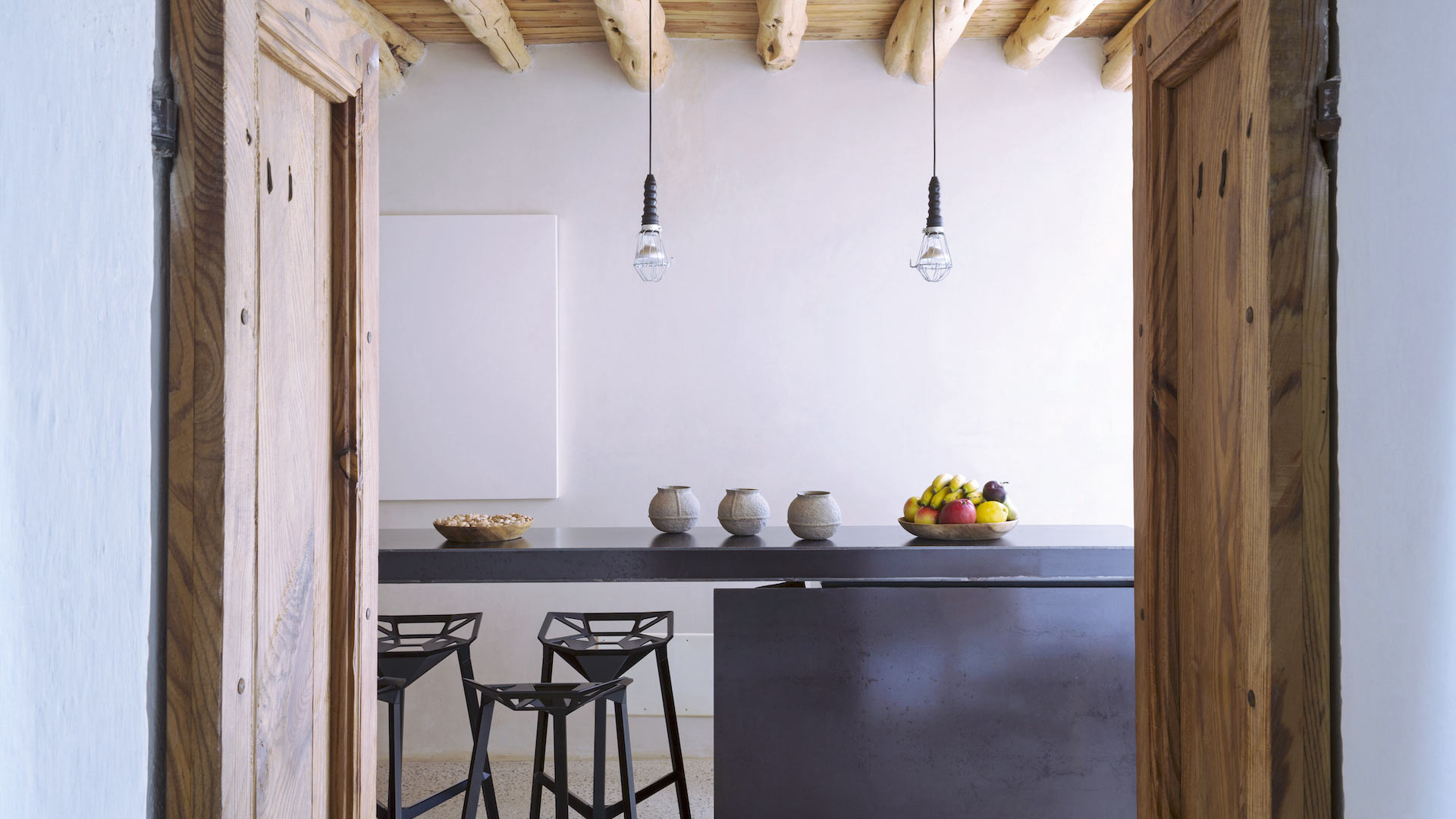 View through the doorway into the breakfast bar at Villa Can Basso in Ibiza