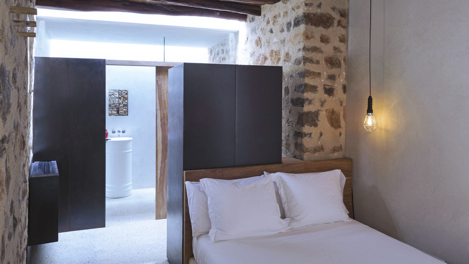 View form the bedroom into the ensuite bathroom at luxury rental Villa Can Basso in Ibiza from Bluemoon