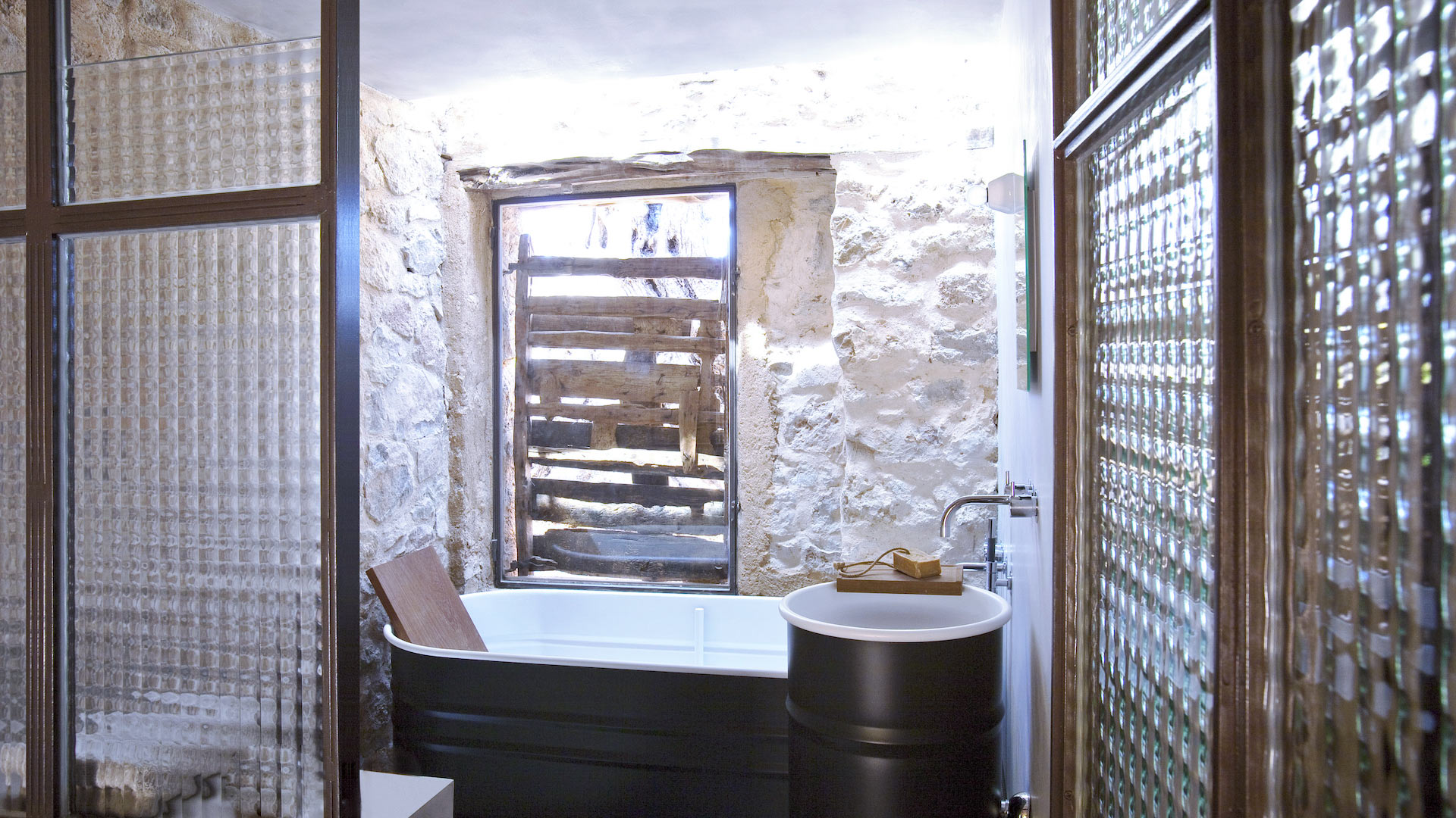 The serene bathtub at Villa Can Basso in Ibiza ideal for soaking and relaxation