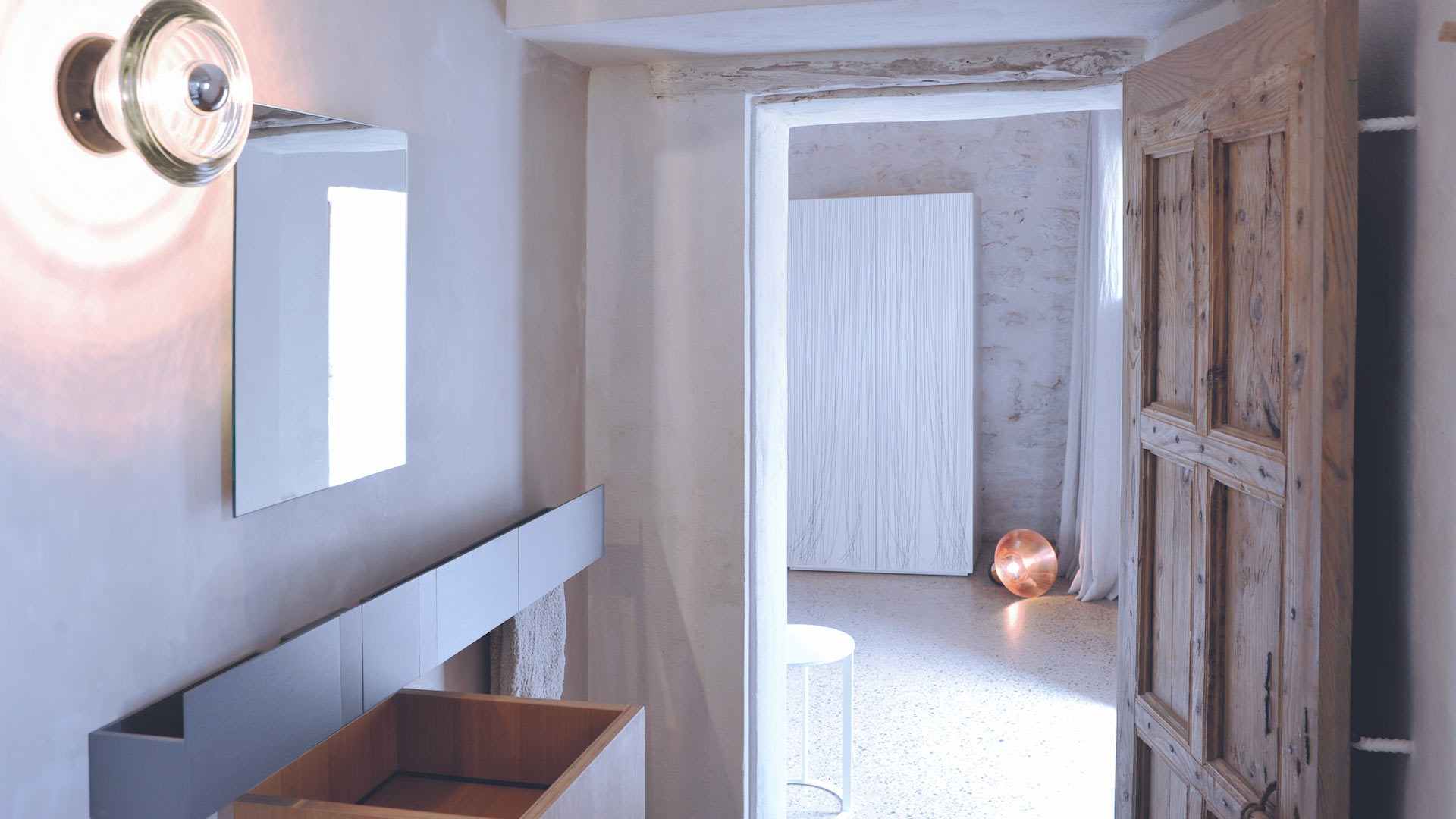 View of the bright and airy hallway at Villa Can Basso in Ibiza