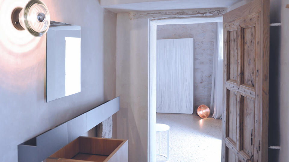View of the bright and airy hallway at Villa Can Basso in Ibiza