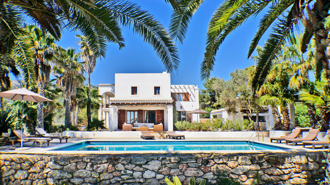 The beautiful stone swimming pool at the luxury villa rental Can Selena in Ibiza