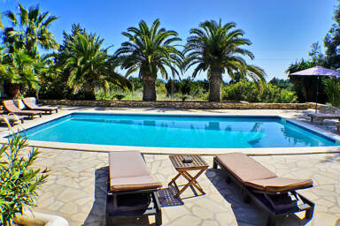 Poolside at the luxury villa rental Can Selena in Ibiza