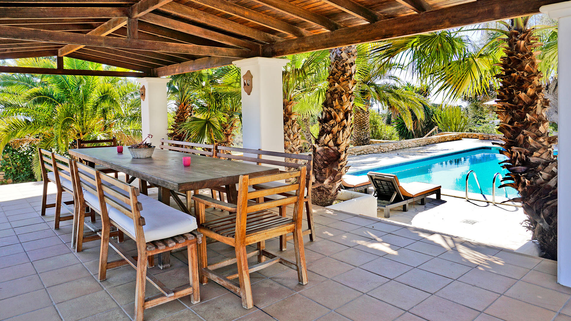Poolside pergola in the luxury villa rental Can Selena in Ibiza