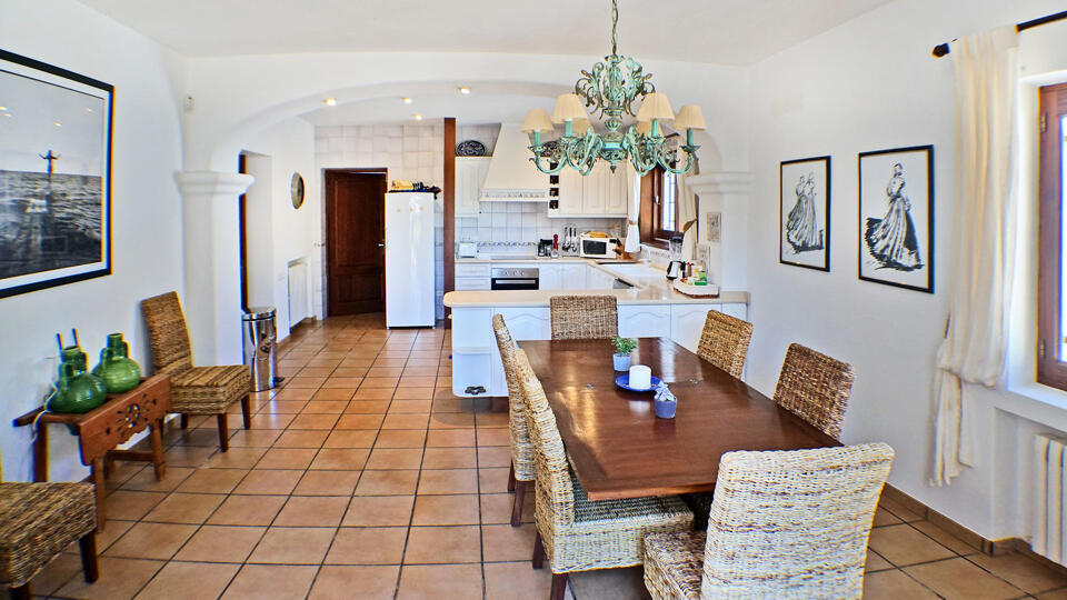 The inviting kitchen / dining space at the luxury villa rental Can Selena in Ibiza