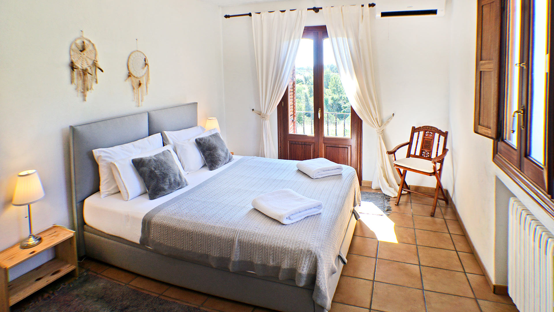 A spacious bedroom in the Can Selena, a luxury villa rental in Ibiza