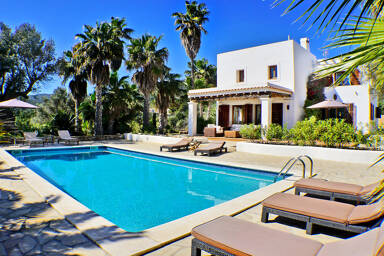 Sunloungers around the pool at the luxury villa rental Can Selena in Ibiza