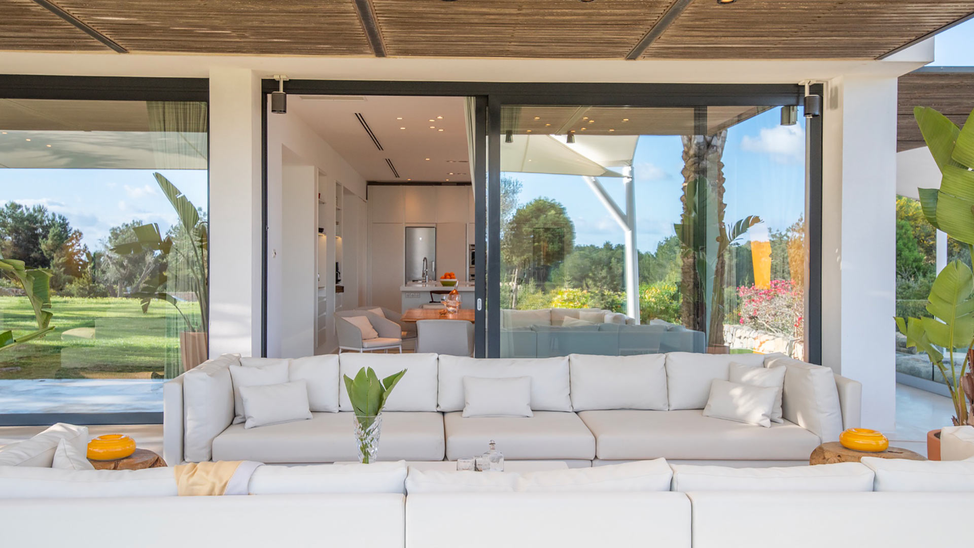 Outdoor grey seating area to soak up the sun in Villa Casa Isa in Ibiza