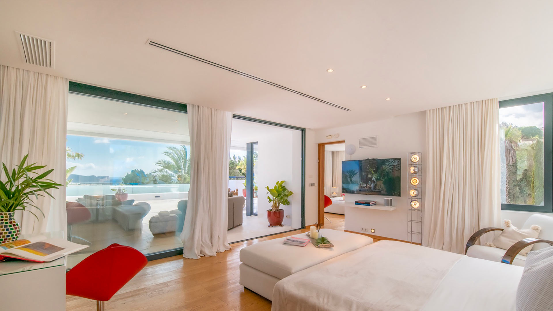 Spacious sofas looking over the beautiful view of Ibiza in Villa Casa Isa