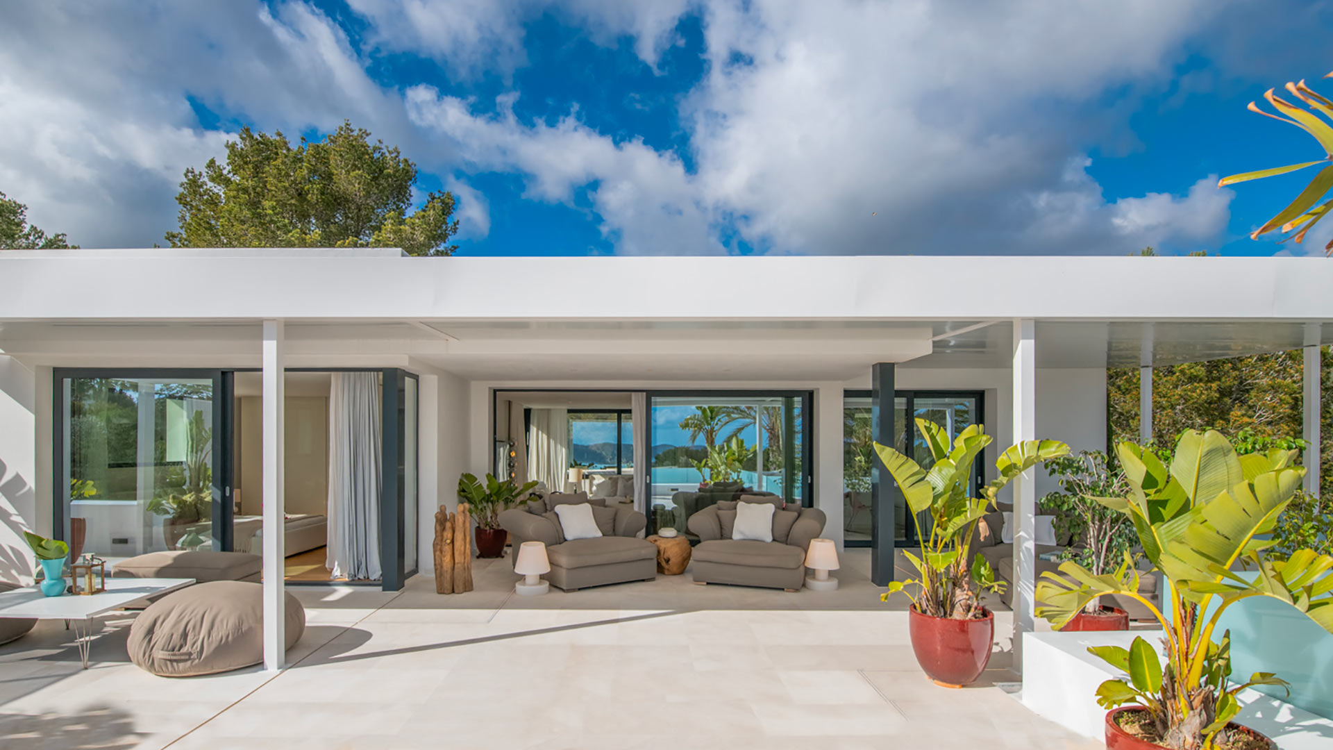 Exterior view of Villa Casa Isa with comfortable furnishings and plenty of plants