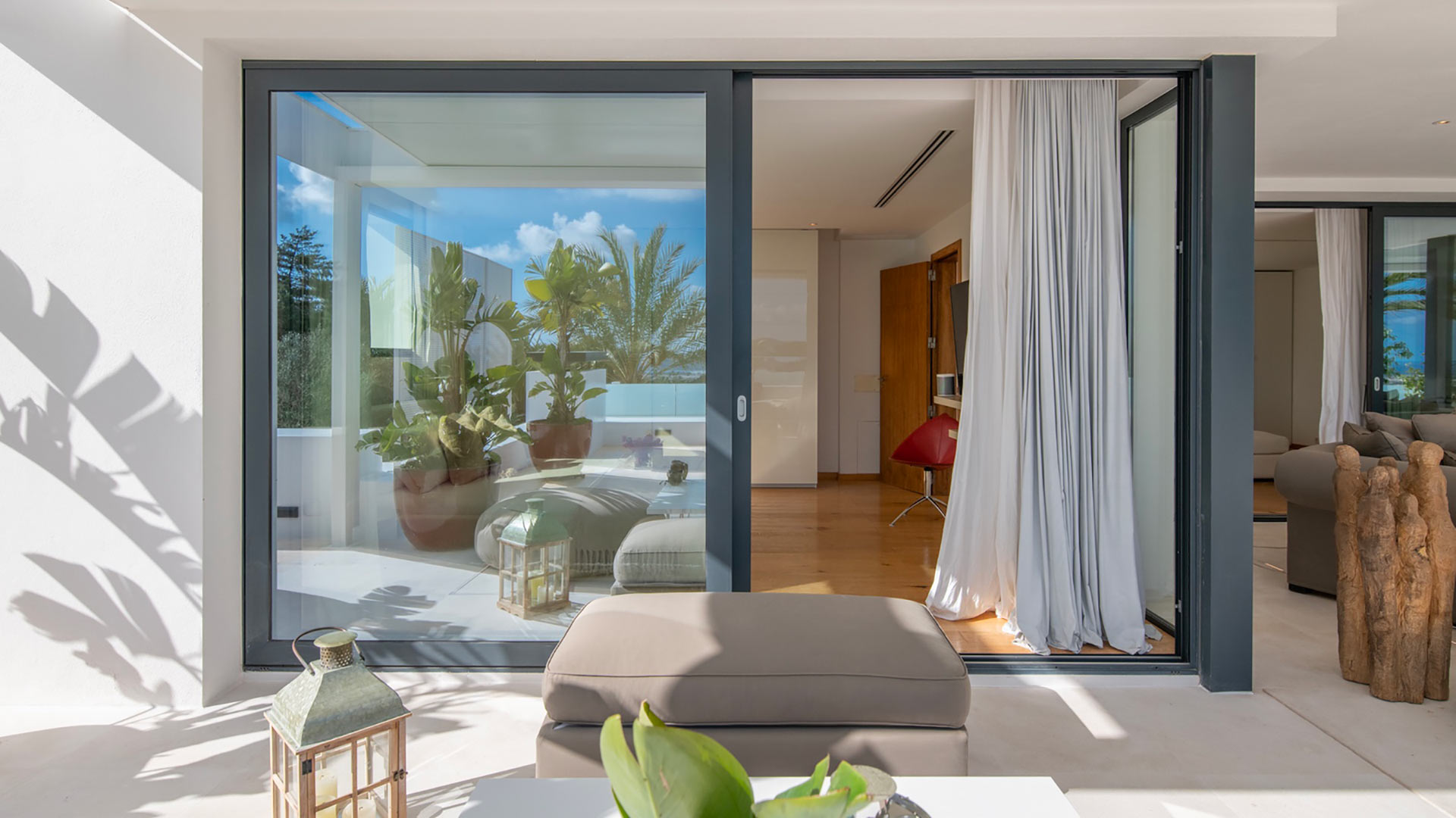 The patio at Villa Casa Isa in Ibiza with comfortable seating options to soak up the sunrise