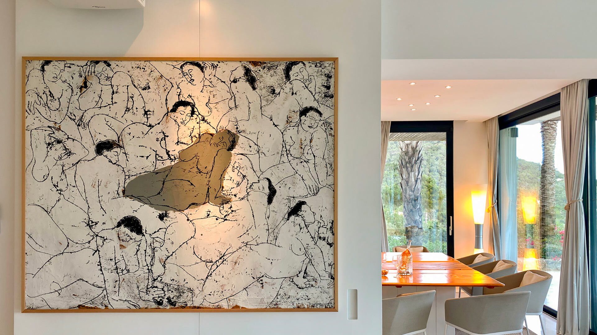 Close up of the grand artwork leading into the dining area at Villa Casa Isa in Ibiza