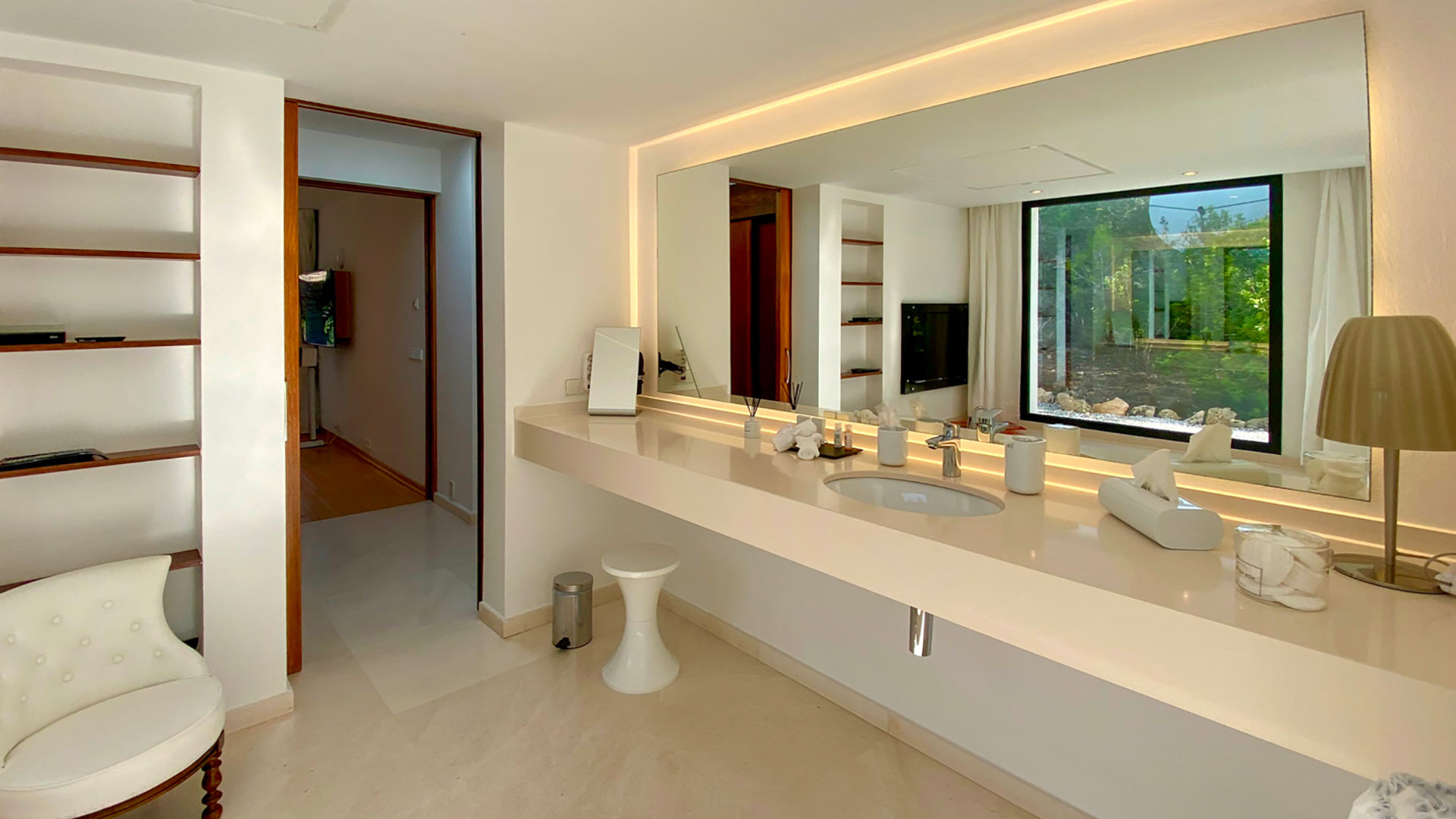 Vanity mirror in the spacious bathroom at Villa Casa Isa in Ibiza