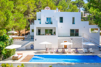 Rear exterior of luxury Villa Fabrik in Ibiza and the beautiful pool