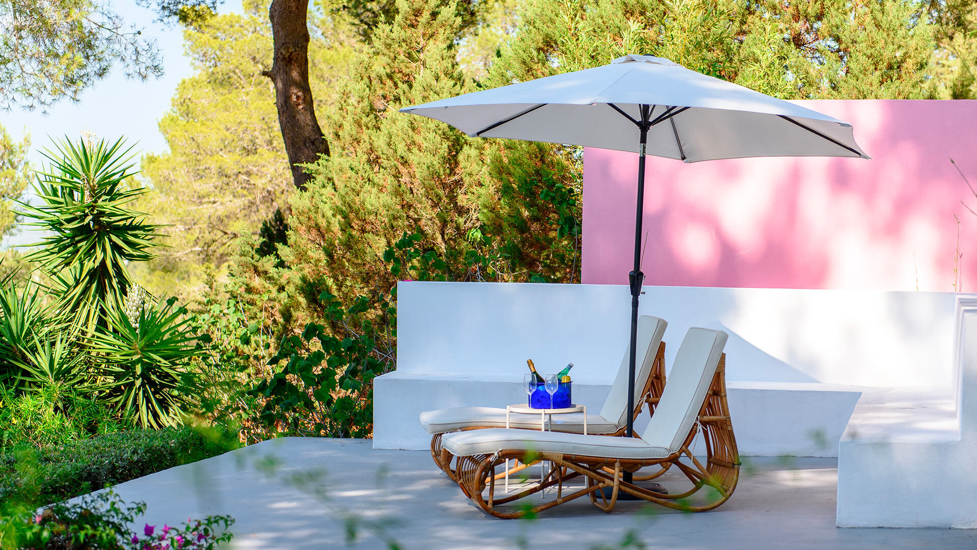 Shaded sunloungers at luxury Villa Fabrik