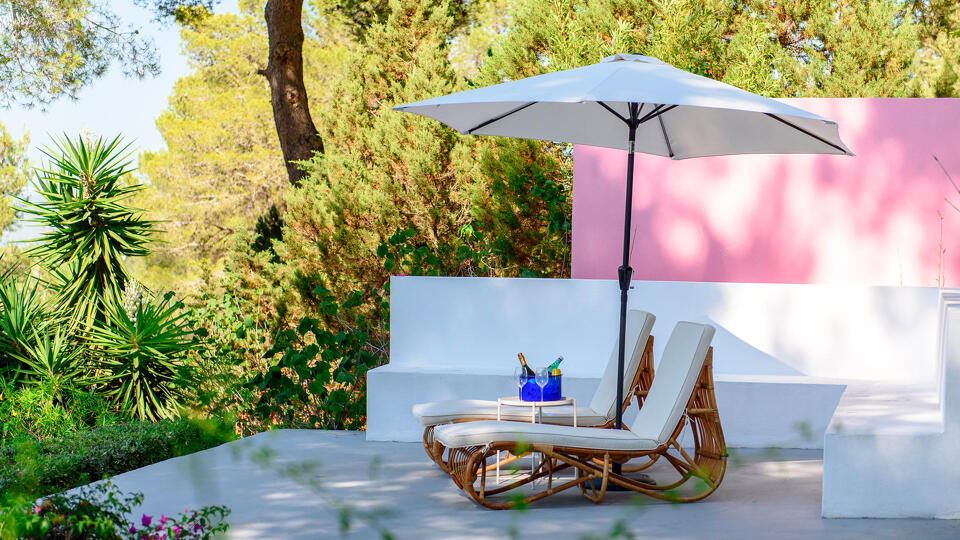 Shaded sunloungers at luxury Villa Fabrik