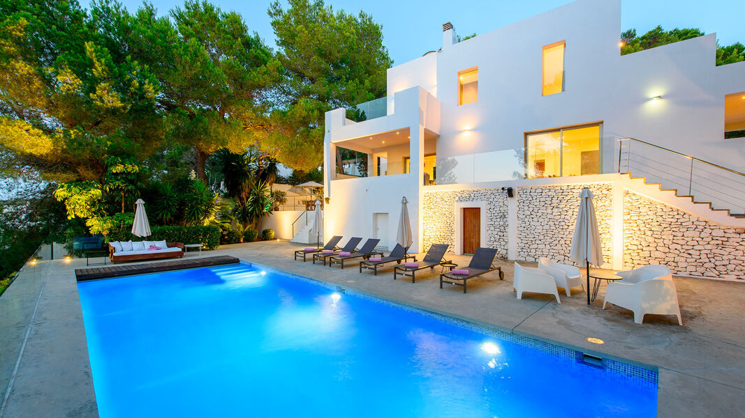 Dusk poolside at the beautiful Ibiza villa Fabrik