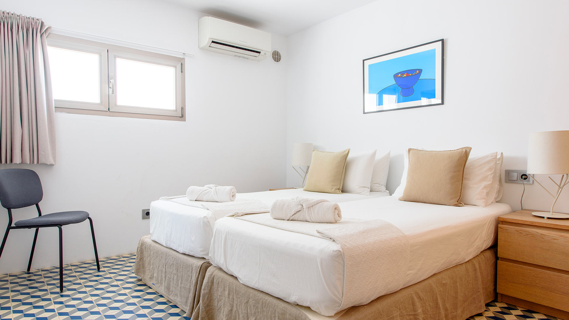 Twin bedroom from Villa Fabrik in Ibiza, a luxury villa rental from Bluemoon