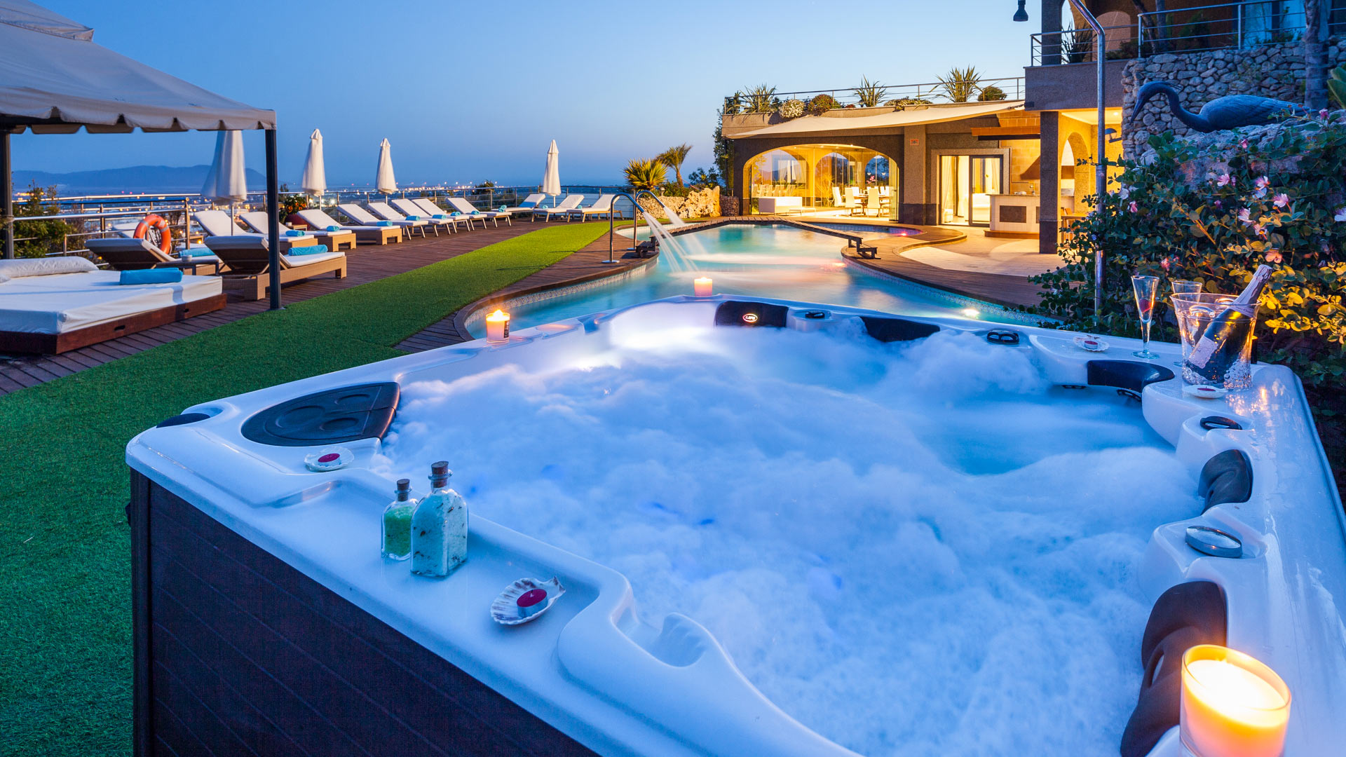 Candlelit jacuzzi at dusk in Villa Fountain Ibiza