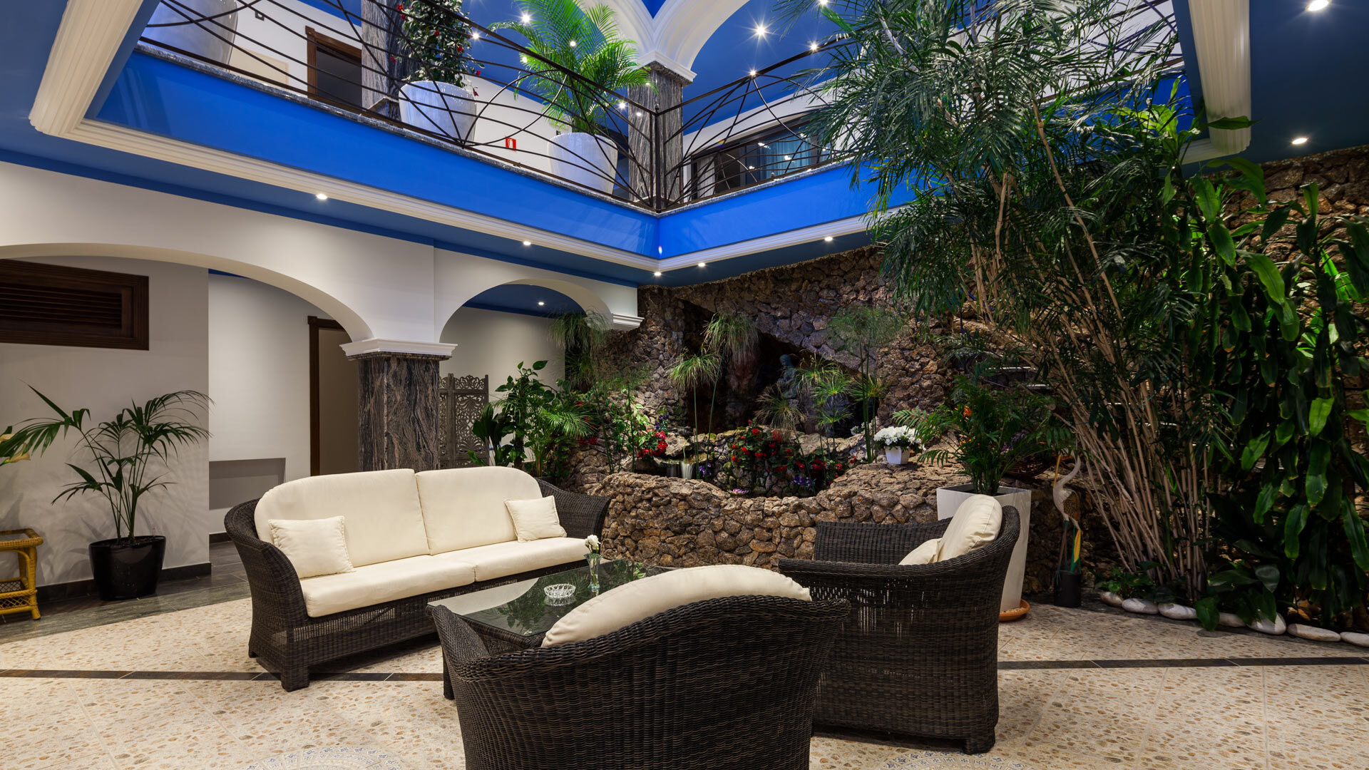 Beautiful sunken lounging area with natural plant touches at Villa Fountain Ibiza