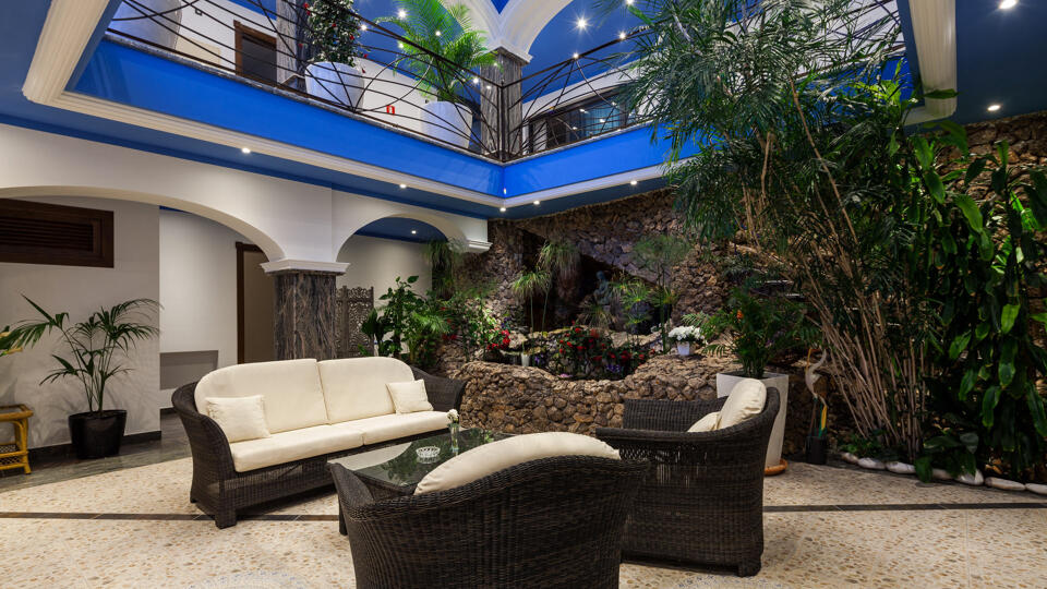 Beautiful sunken lounging area with natural plant touches at Villa Fountain Ibiza