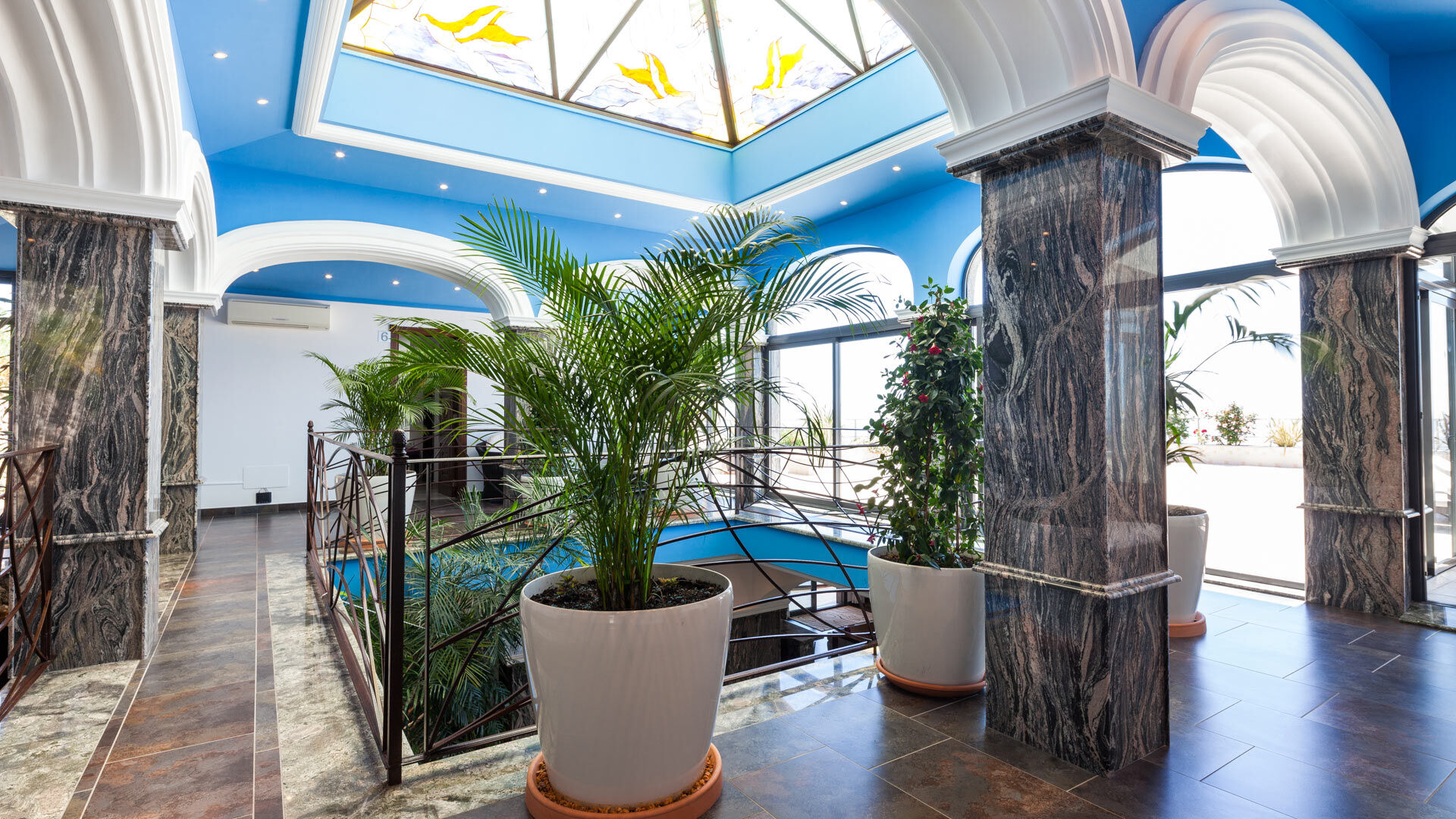 The beautiful blue sun room with skylight at Villa Fountain Ibiza