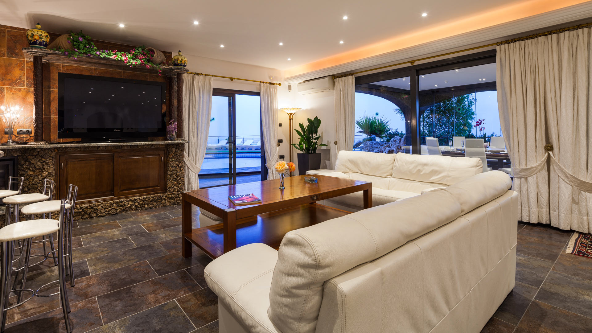The large living area ideal for relaxing and viewing the beautiful exterior at Villa Fountain Ibiza