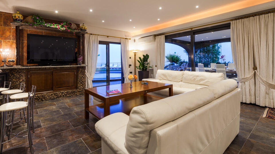 The large living area ideal for relaxing and viewing the beautiful exterior at Villa Fountain Ibiza
