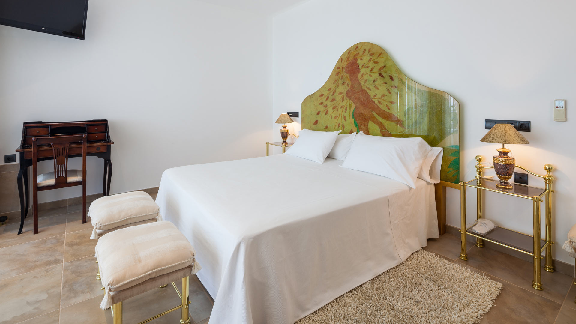 White walled bedroom at Villa Fountain Ibiza luxury villa rental