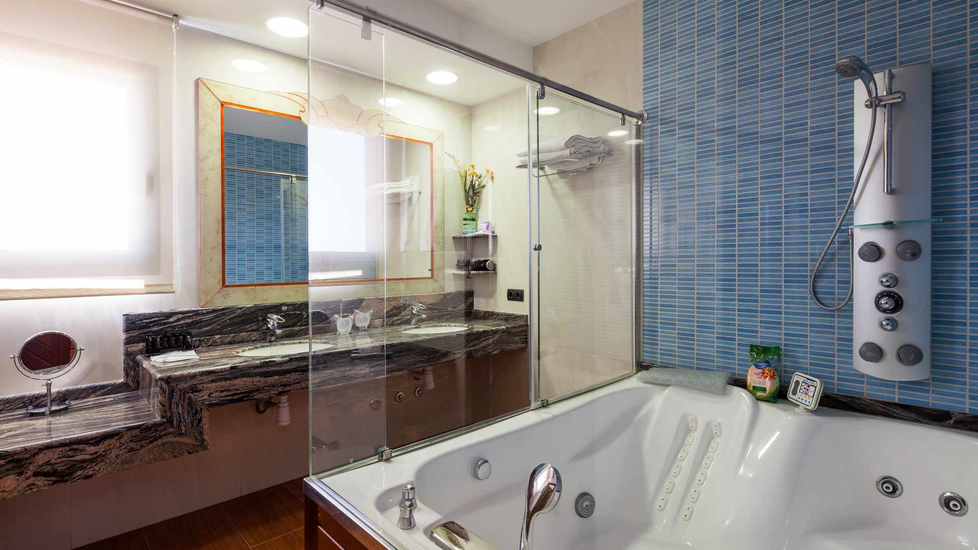 One of the bathrooms with large jacuzzi-style bathtub at Villa Fountain Ibiza