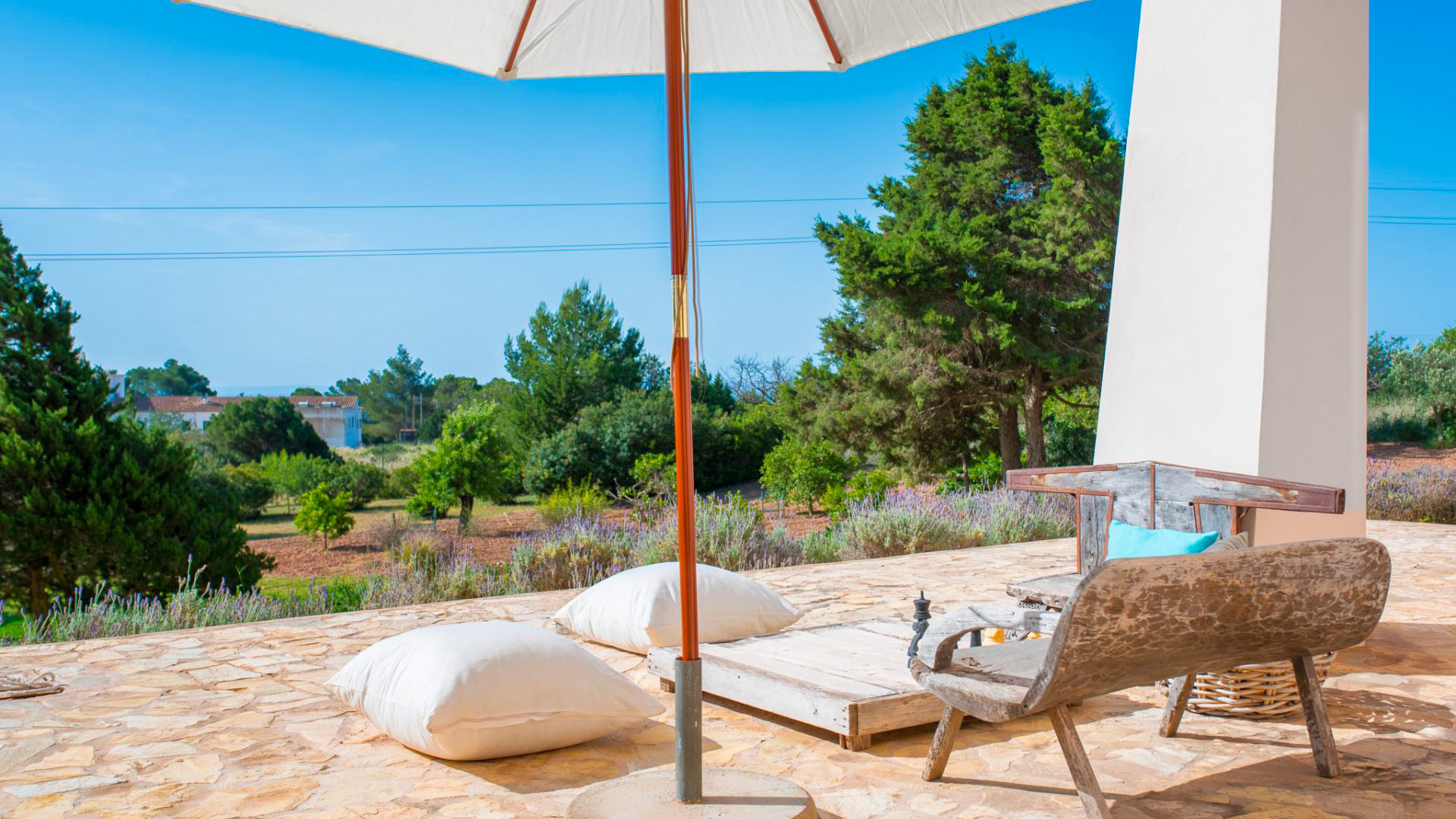 Exterior view of Ses Boques over the sea - luxury villa rental in Ibiza