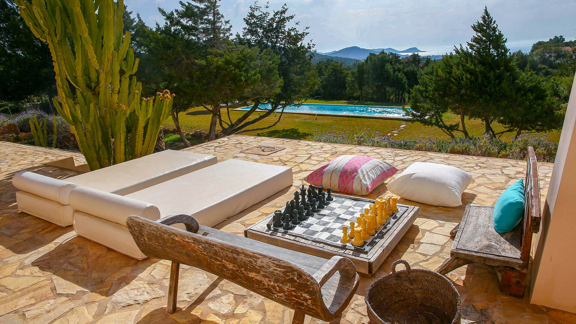 Pool view from lounging area at Ses Boques - luxury villa rental in Ibiza