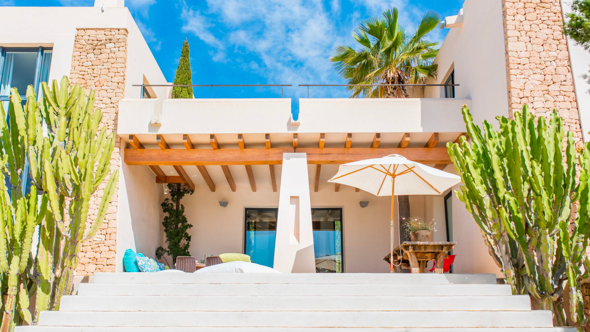 Front exterior view of Ses Boques - luxury villa rental in Ibiza