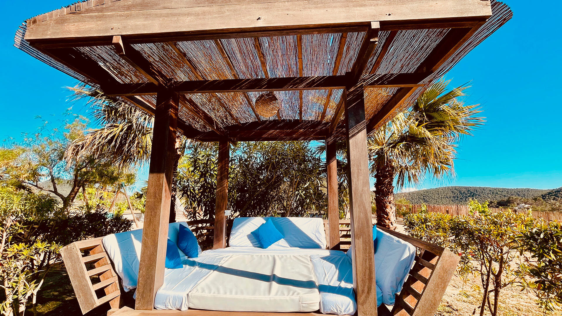Shaded dining table at the Villa Torre Pau in Ibiza