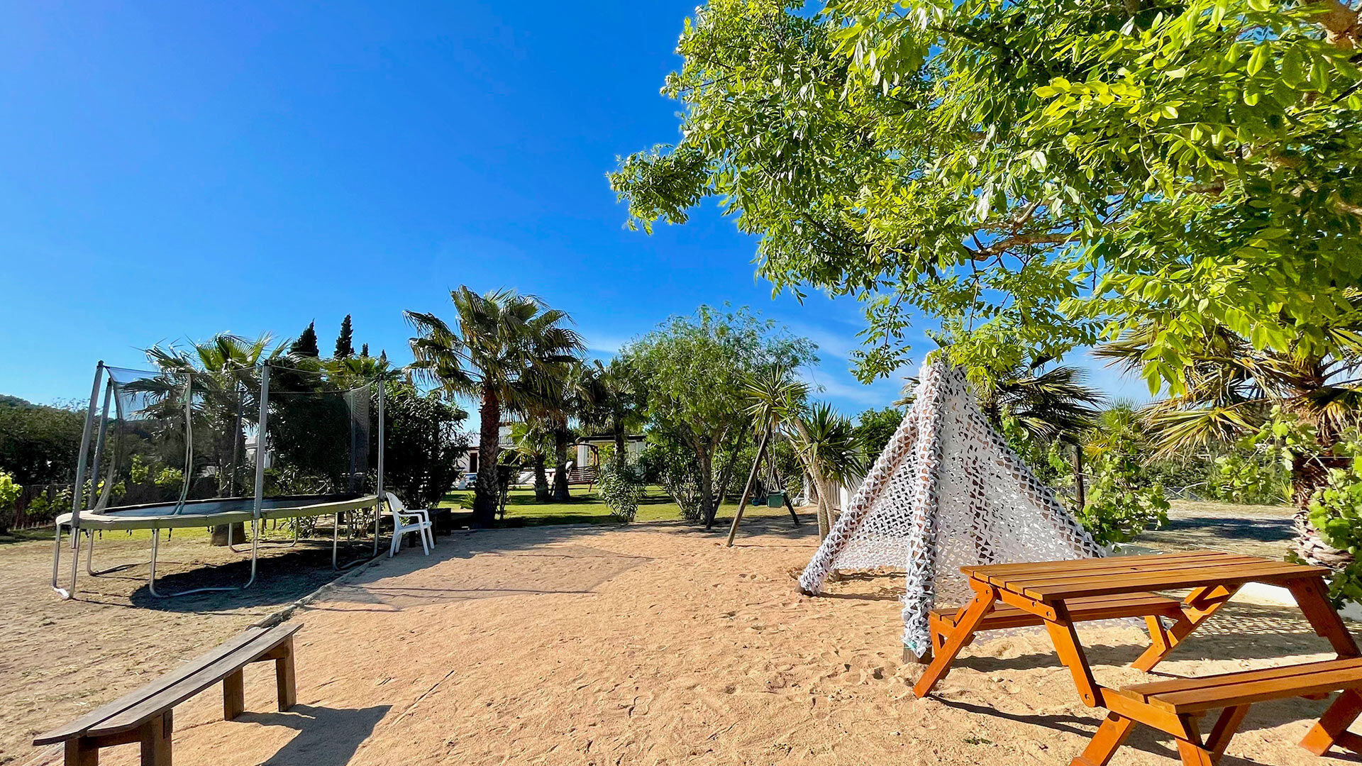 The tepee and trampoline of Villa Torre Pau in Ibiza ideal for families with kids
