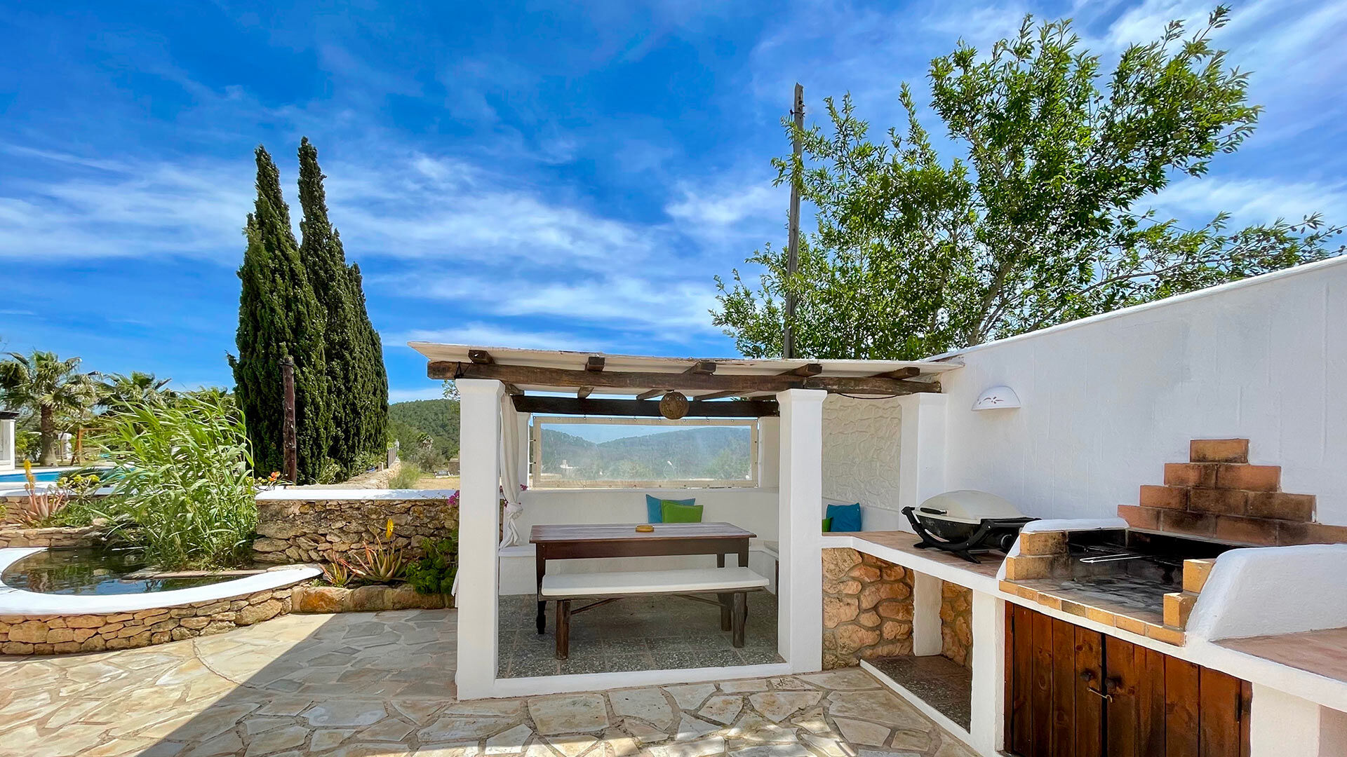The dining and BBQ exterior area of Villa Torre Pau in Ibiza