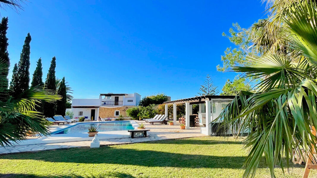 View of the incredible landscaping at Villa Torre Pau and the beautiful pool