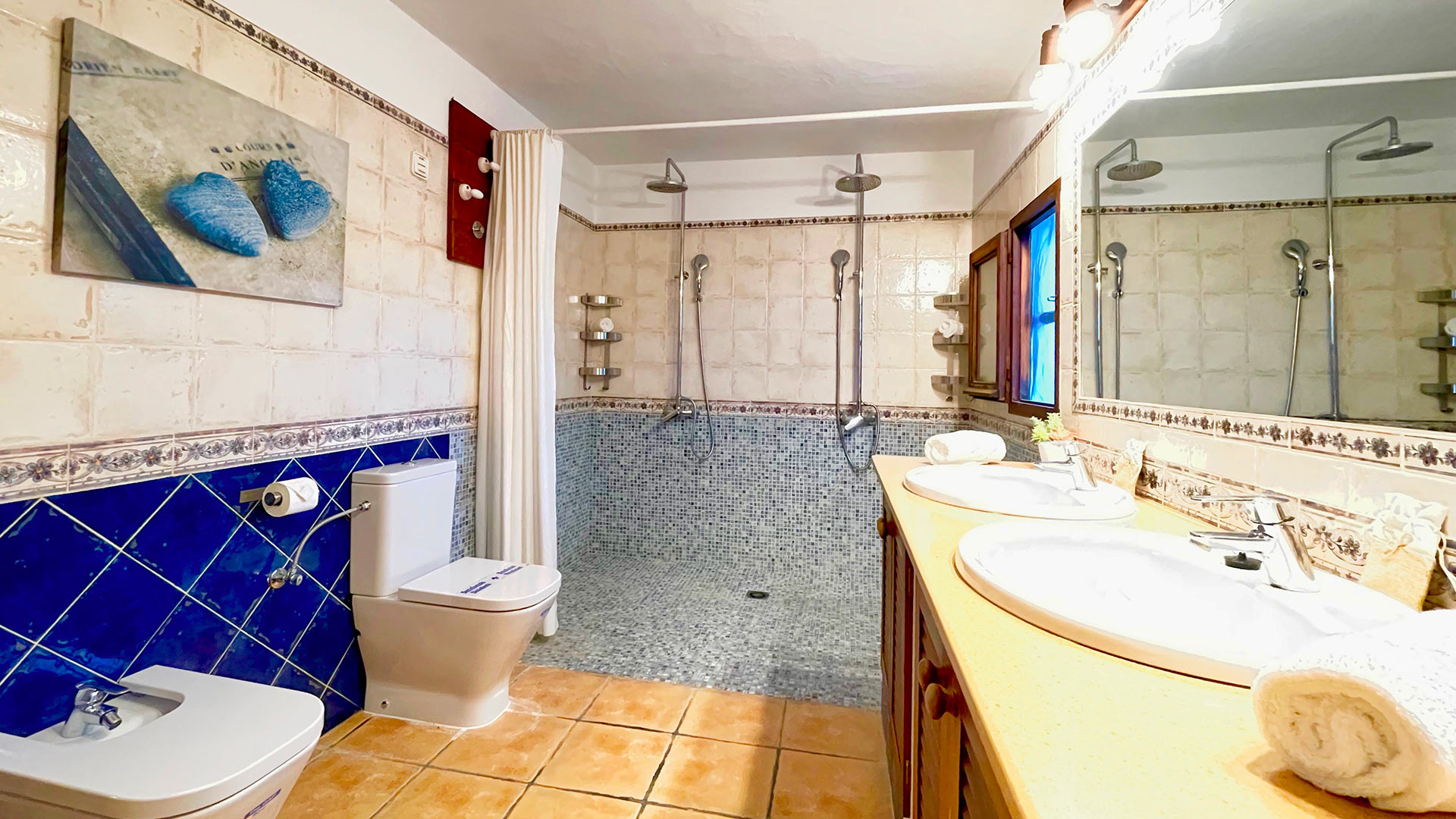 Walk in shower in one of the bathrooms in Villa Torre Pau in Ibiza
