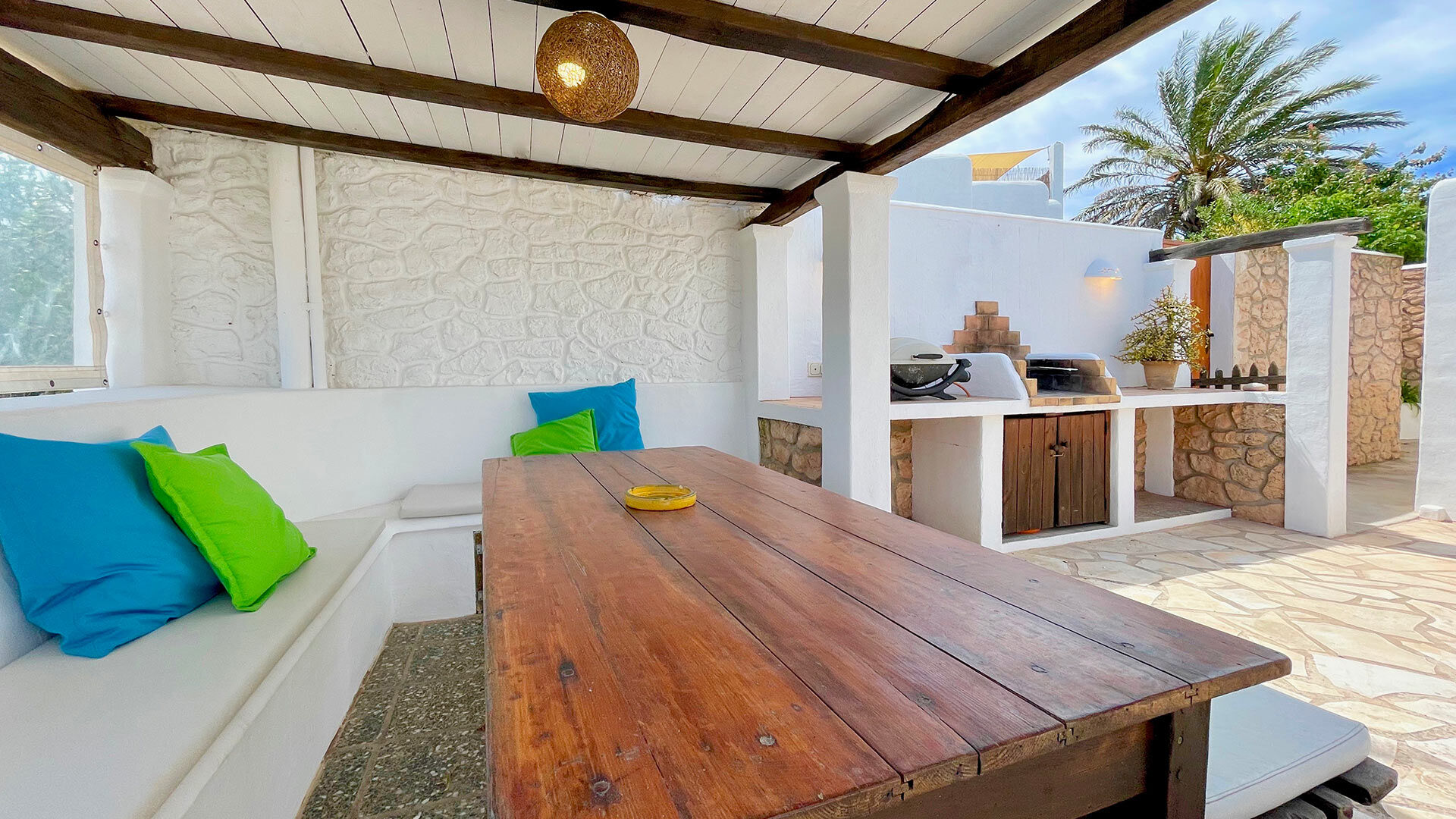 Pergola in with dining table for alfresco dining or quiet gatherings around in the evening at Villa Torre Pau