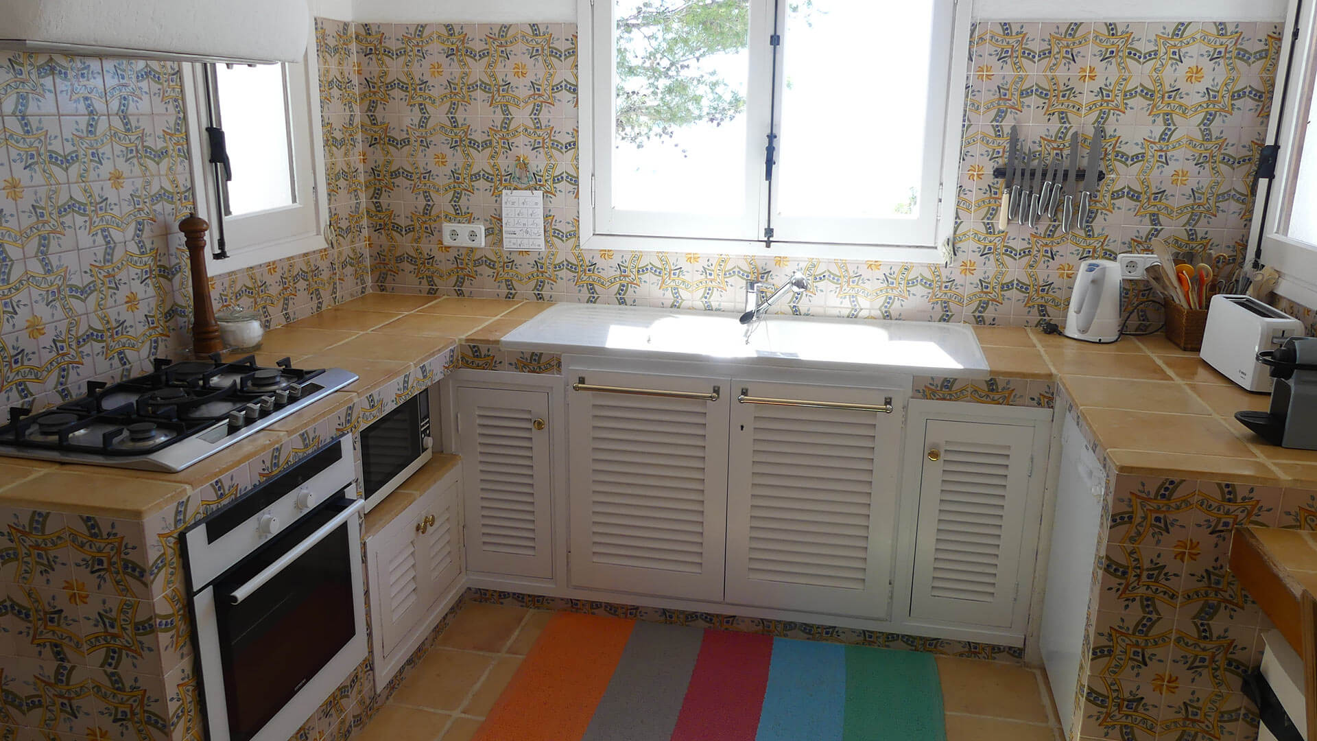 The classically Ibizan kitchen in Villa Trillo with plenty of modern amenities